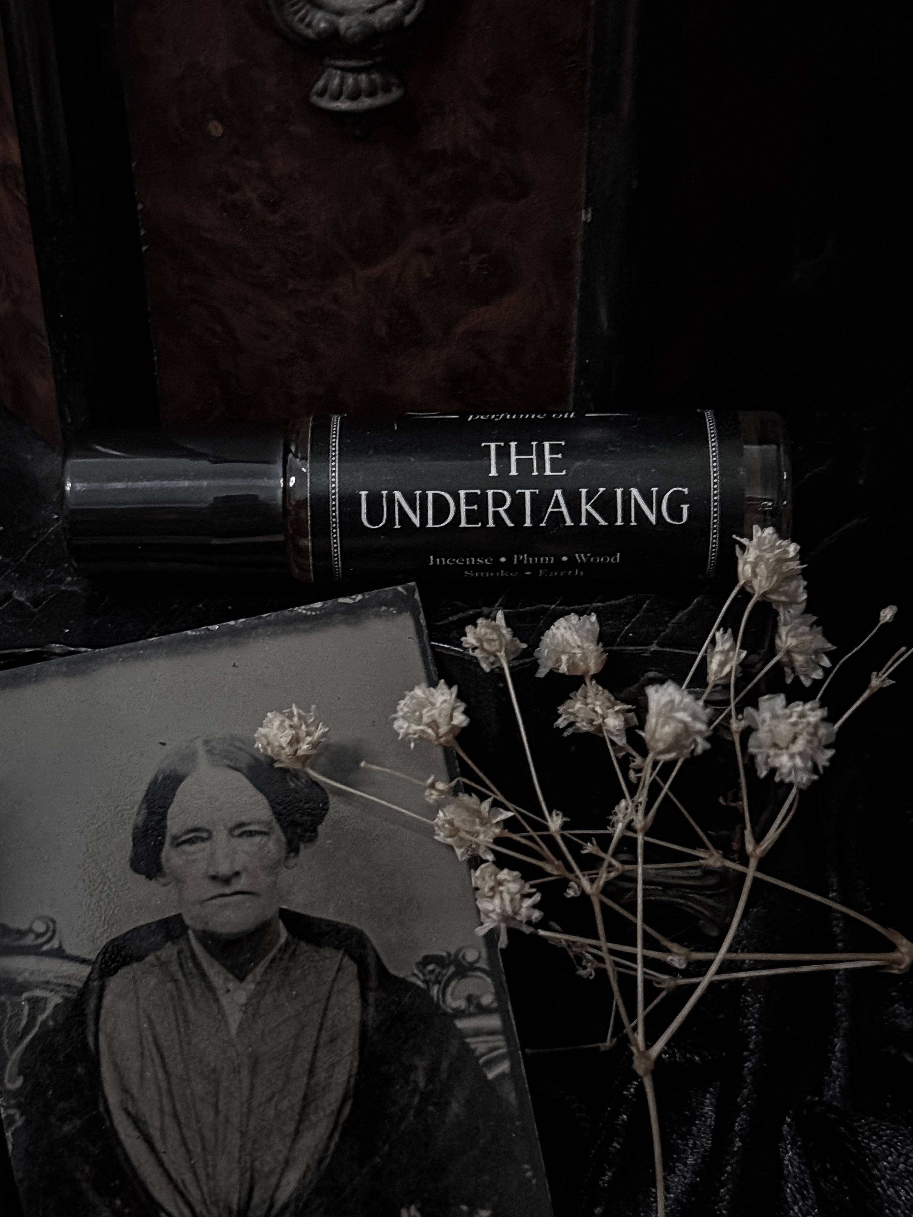 The Undertaking (plum & smoky wood)