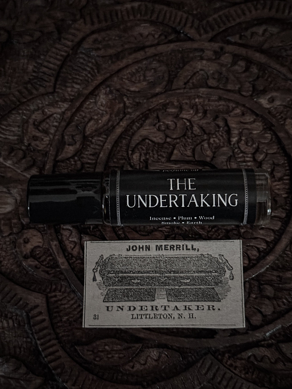 The Undertaking (plum & smoky wood)