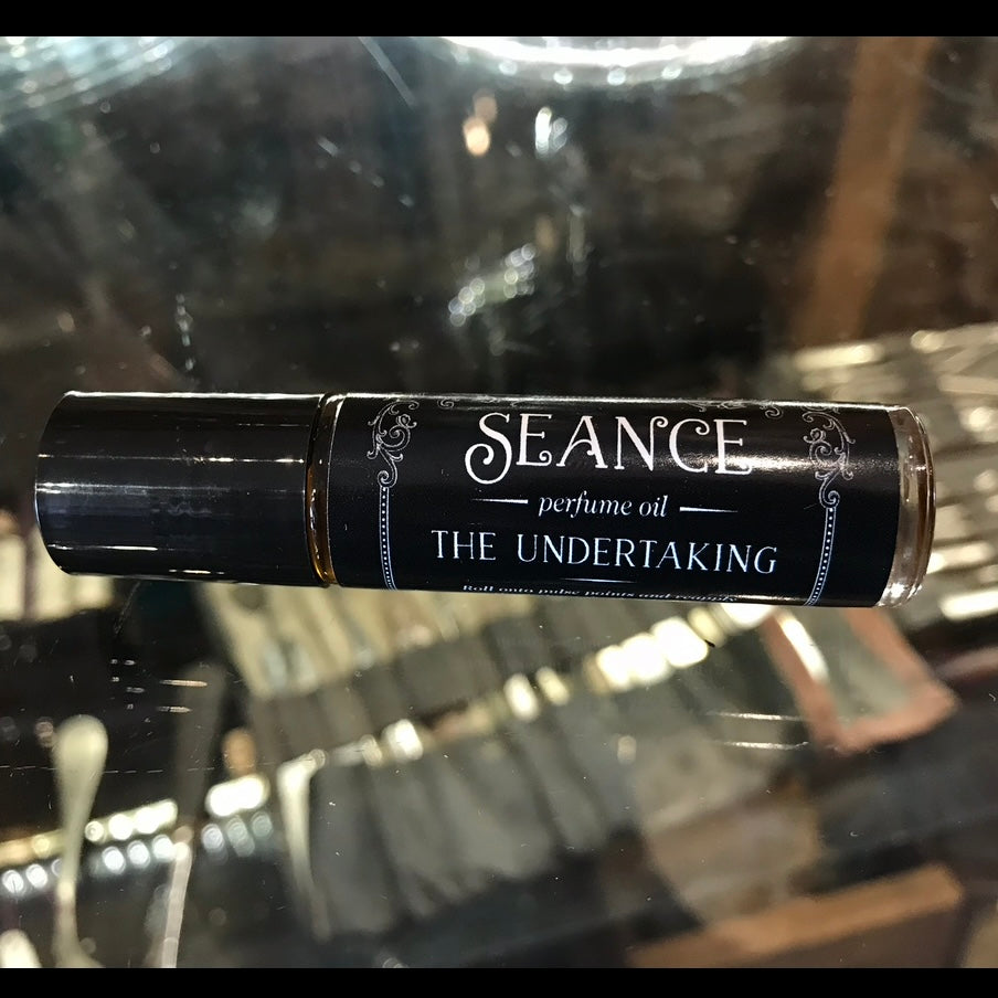 The Undertaking (plum & smoky wood)